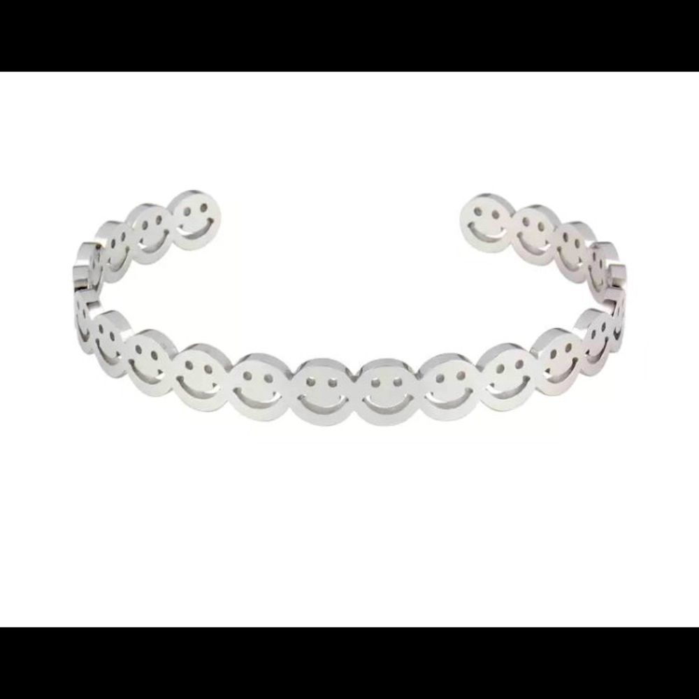 Silver tone smiley face stainless steel bangle bracelet
